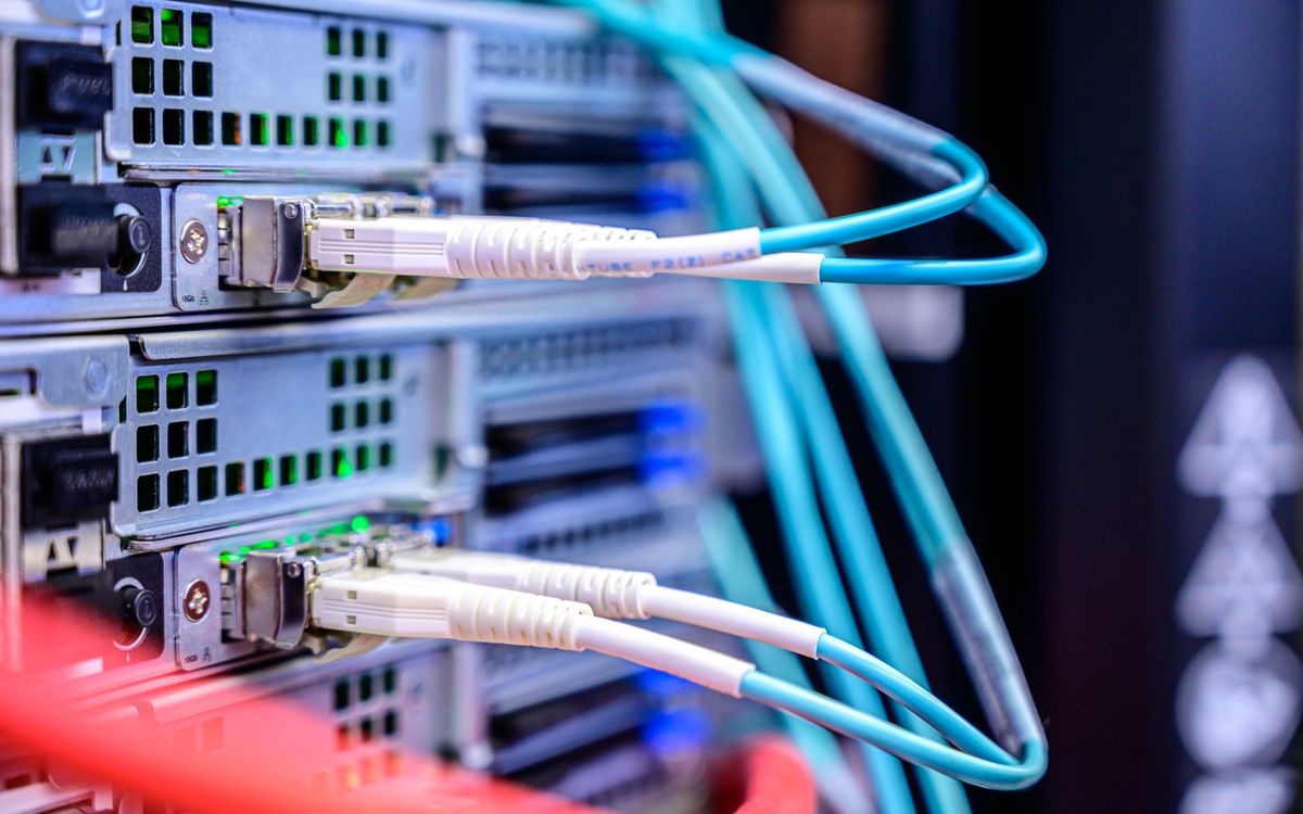 Network cables connected to server ports