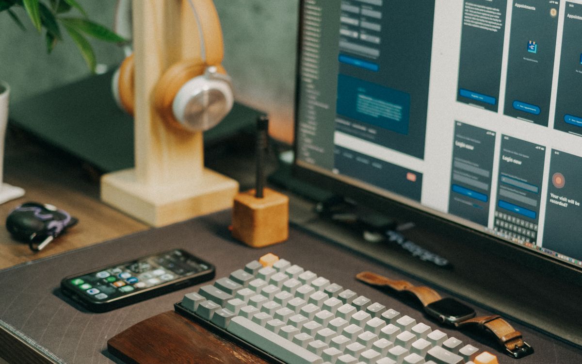 Desktop computer, keyboard, and mouse in a workspace