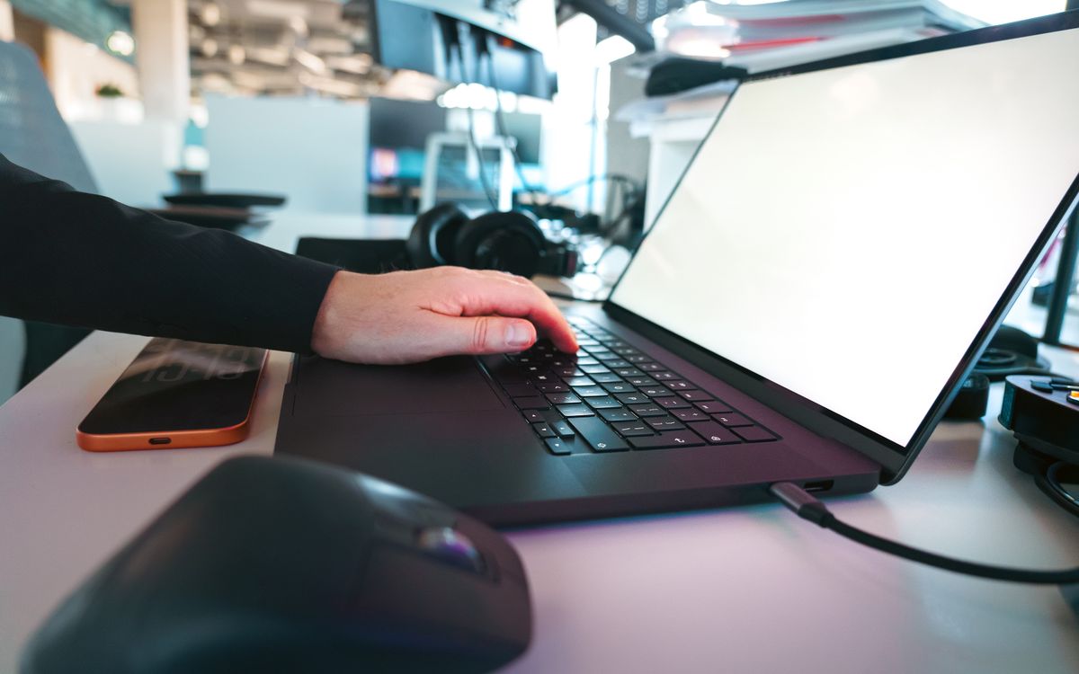 Laptop and digital devices in a modern workspace